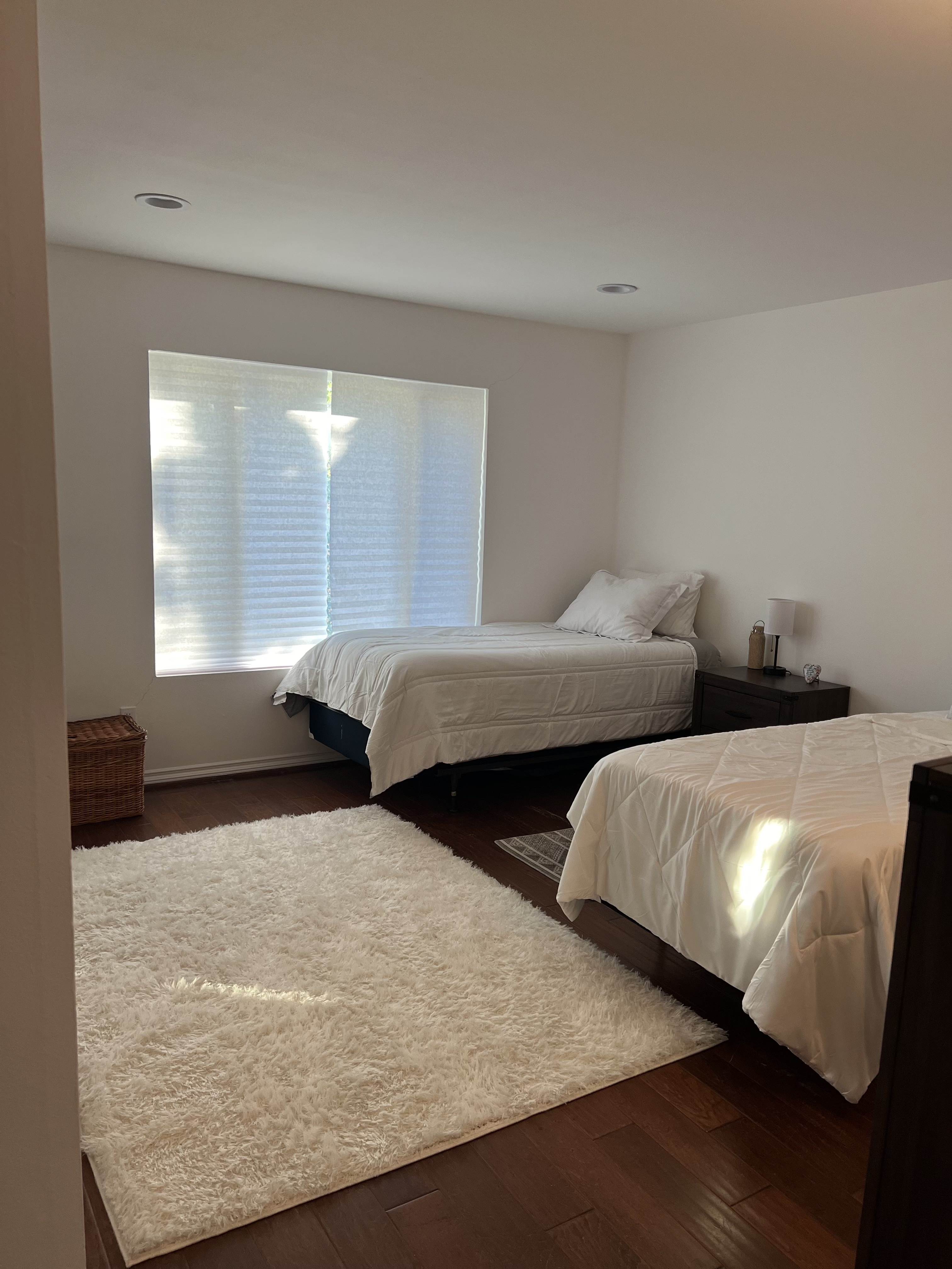 Bright bedroom with twin beds