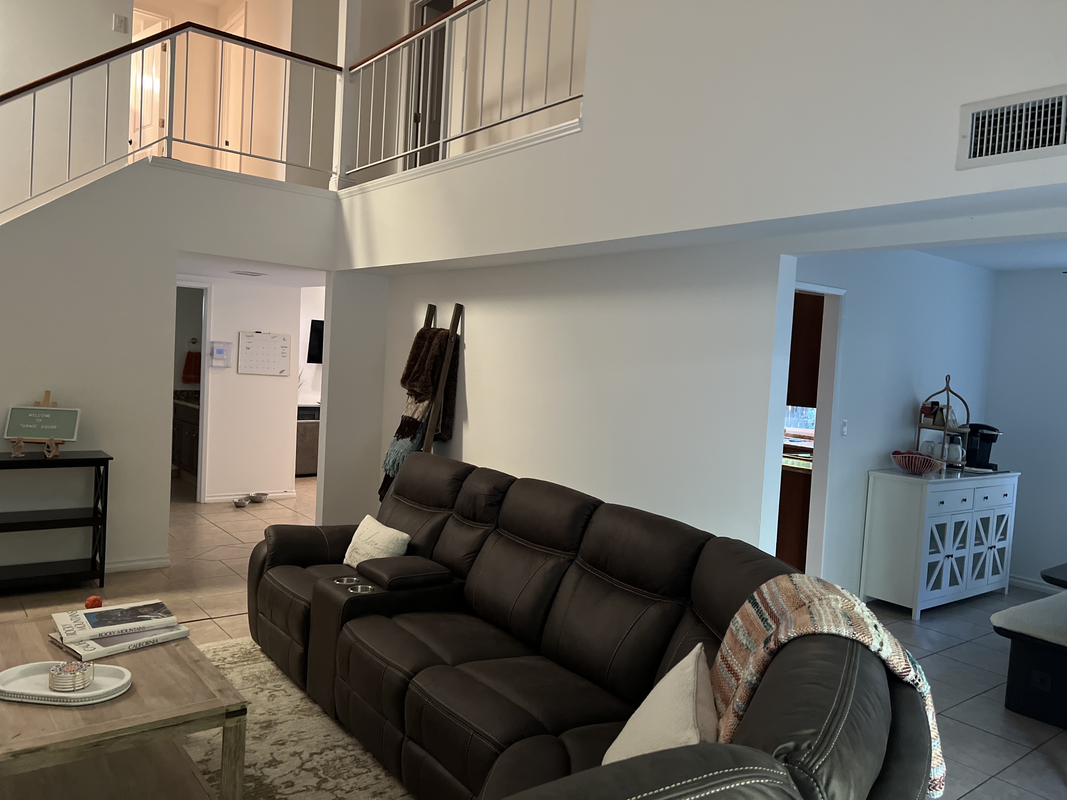 Open living room with loft view